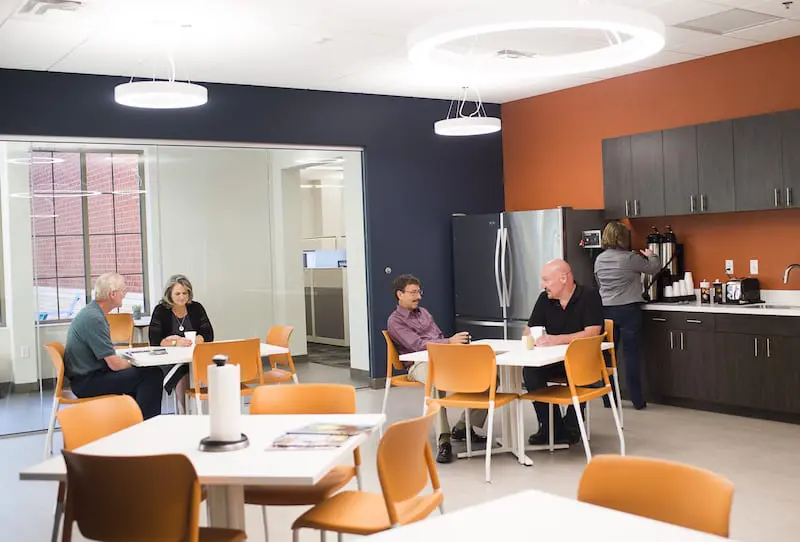 Employees in break room.