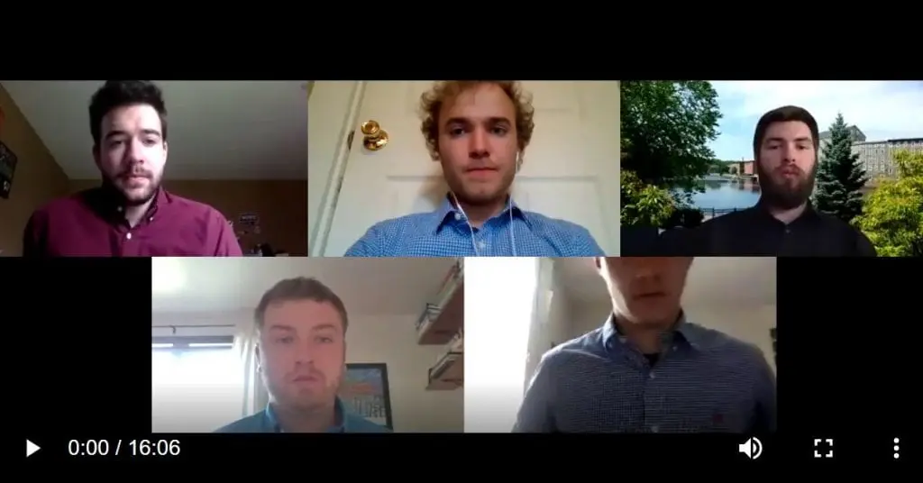 Employees attending an online meeting.