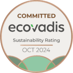 A round badge with the words "Committed wunderlich-malec ecovadis Sustainability Rating OCT 2024" in the center, featuring green and brown accents at the bottom.