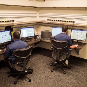 Two Wunderlich-Malec employees working at computers.