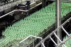 Bottles on an automated assembly line.