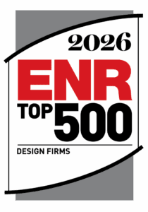 A badge-style graphic featuring "2026 ENR Top 500 Design Firms" in bold red and black letters, accented by black and gray, proudly highlights wunderlich-malec on a clean white background.