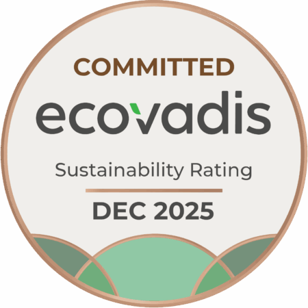 A round badge featuring the text: "Committed Ecovadis Sustainability Rating Dec 2025" with green curved shapes at the bottom, highlighting wunderlich-malec's dedication to sustainable practices.